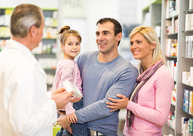 Family talking to pharmacist