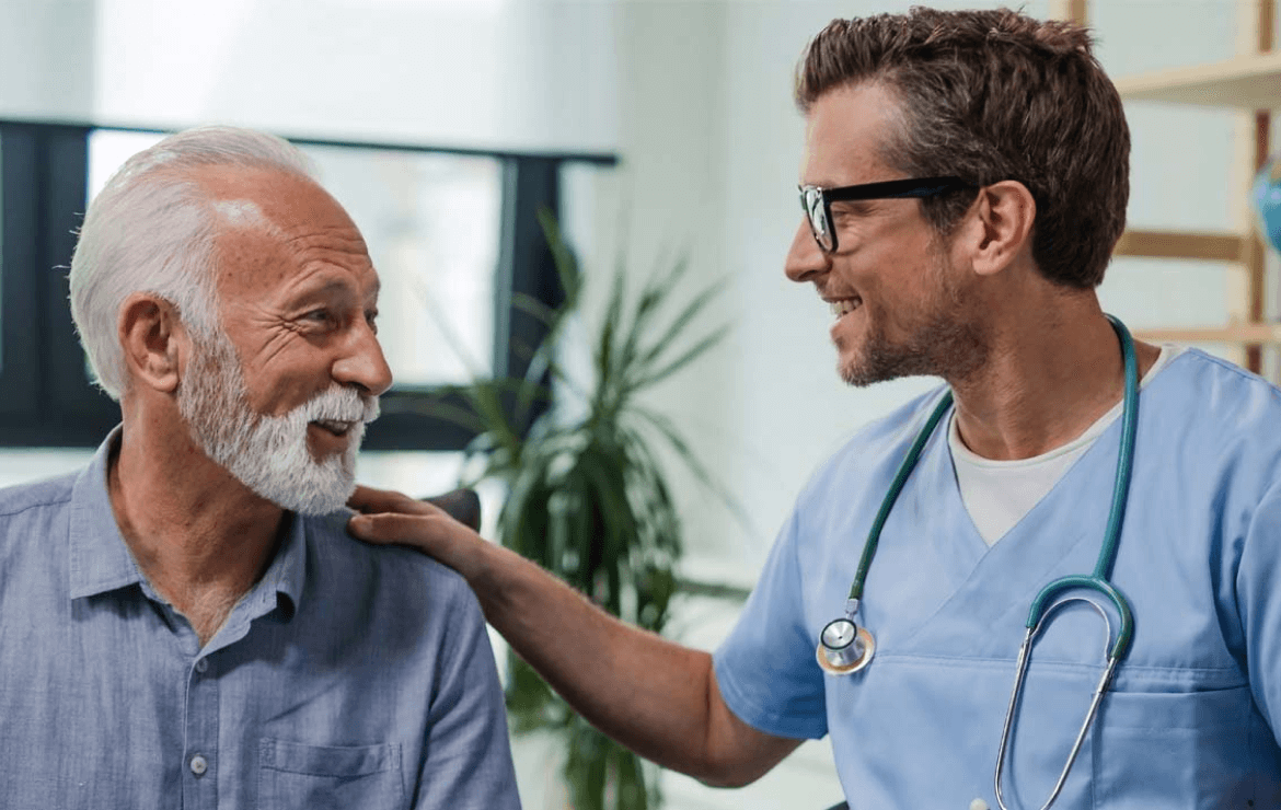 Doctor placing hand on patient's shoulder