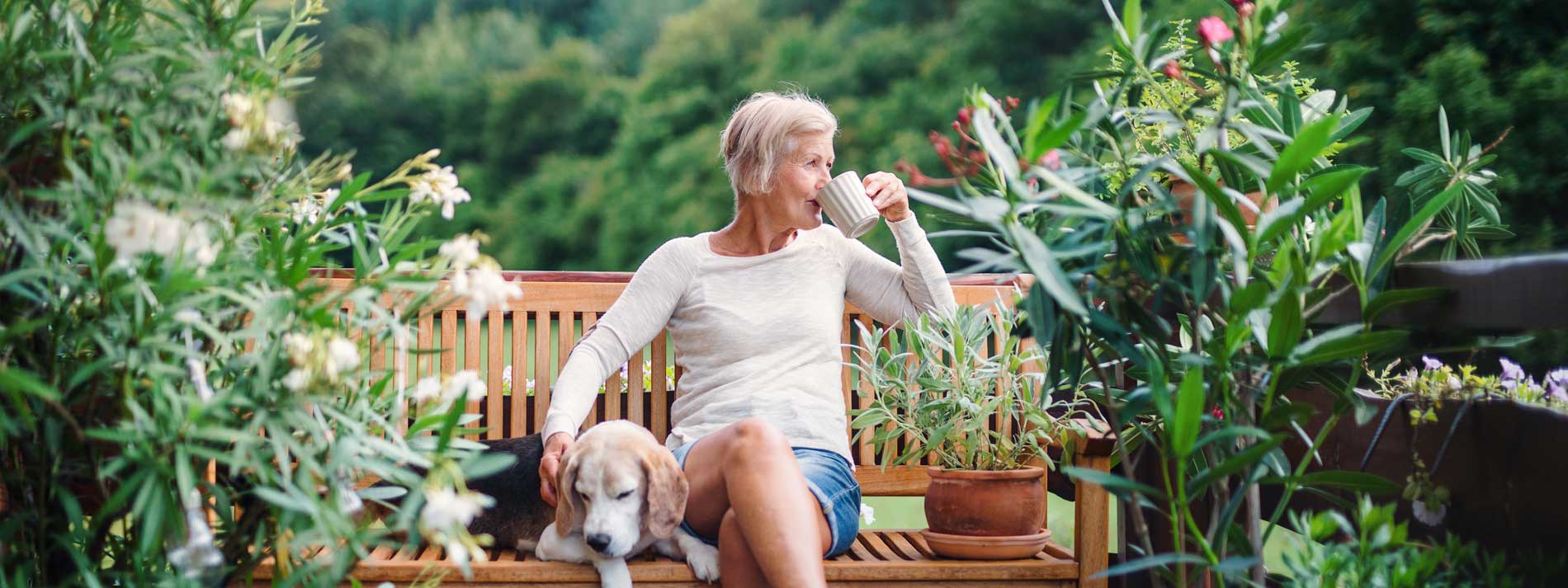 hero-woman-older-relaxing-garden-tea